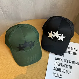 American high street trucker hats with star patchwork embroidery in black and green