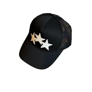 Classic black trucker hat with white stars embroidery and breathable mesh back
