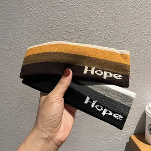 Fasce sportive in maglia con ricamo Hope in tonalità a strisce marroni e grigie