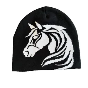 Winter knitted beanie featuring a bold black and white horse jacquard pattern design
