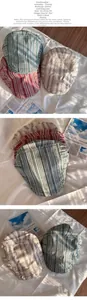 Detailed view of vintage striped cotton-polyester hats with head circumference of 55-59cm