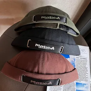 Retro cotton docker hats in green, black, and brown with masicM embroidered branding