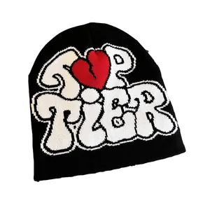 Black beanie with Top Tier graffiti lettering and red heart in street style