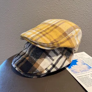 Retro plaid newsboy caps in yellow and black wool blend for autumn and winter fashion