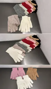 Detailed knit texture of rabbit hair blend winter gloves shown in various colors