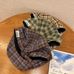 Three retro plaid ivy caps for men and women with adjustable metal buckles and labels