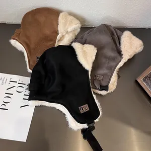 Thick suede trapper hats in black brown and grey with warm faux fur lining and buckle