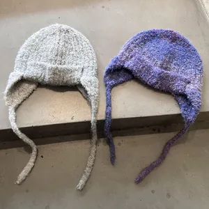 Winter plush knit trapper hat with earflaps in grey and gradient purple yarns