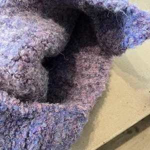 Women's warm winter plush knit trapper hat in gradient purple and blue boucle yarn
