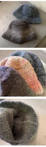 Close-up of thick multi-colored knit texture and soft yarn fabric on a winter bucket hat