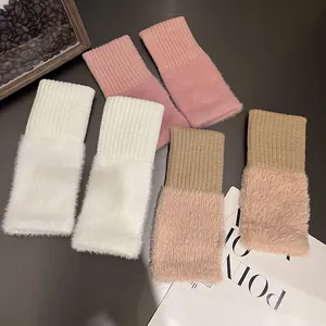Knit and faux fur winter wrist warmers set in white, pink, and brown plush styles