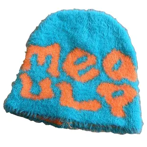 Chic blue fuzzy knit beanie with orange jacquard lettering for winter warmth