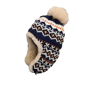 Bonnet d'hiver en tricot jacquard avec doublure polaire chaude et pompon moelleux
