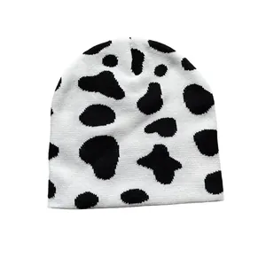 Winter knitted cow print beanie hat for women featuring warm casual outdoor style