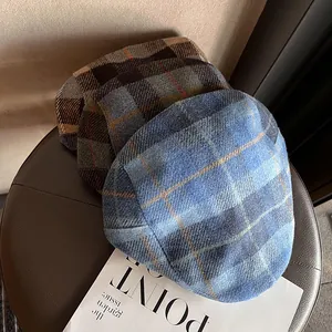 British style plaid tweed beret caps in blue and brown colorways for autumn fashion