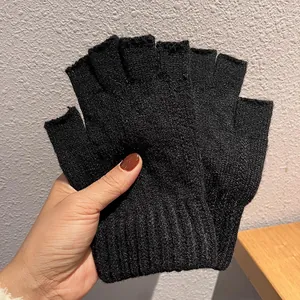 Thick knitted fingerless gloves in black for winter warmth and easy touchscreen use