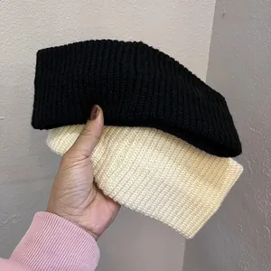 Black and cream rib-knit beanies for women showing winter street style texture and fit