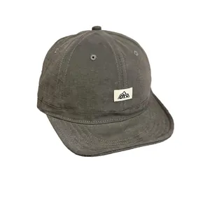 Retro dark grey canvas short brim baseball cap with vintage OYX mountain woven label