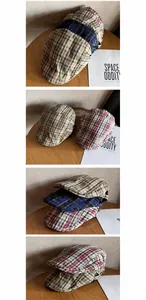 Detailed view of British style plaid newsboy cap showing woven cotton polyester texture