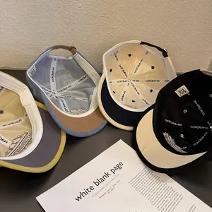 Multiple colorblock short brim baseball caps with adjustable straps and soft cotton texture