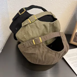 Retro five-panel baseball caps in black, green and brown with metal back adjustment