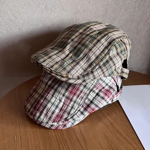 Retro khaki green and red plaid flat caps for men and women with adjustable straps