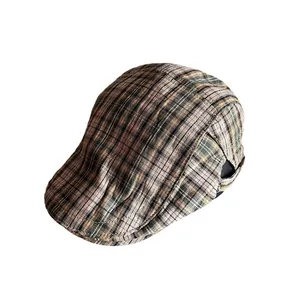 Retro khaki green plaid ivy cap with classic vintage pattern in a clean profile view