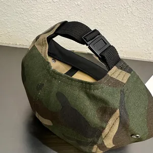 Detail of outdoor camo baseball cap showing adjustable black buckle and nylon strap system