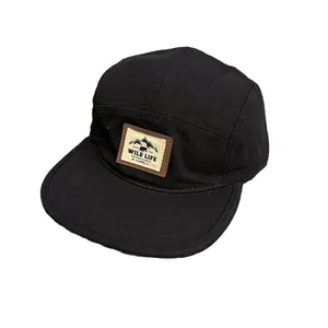 Black 5-panel camper cap with Wild Life mountain patch for outdoor activities