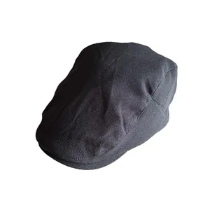 Classic dark gray newsboy cap in twill fabric with retro flat cap design and short brim