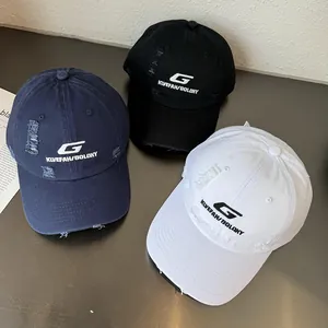 Distressed cotton baseball caps with letter embroidery in navy, black and white colors
