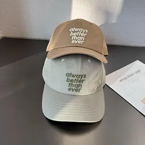 Classic embroidered twill cotton baseball caps in khaki and green with stylish lettering