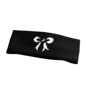 Klassisches schwarzes Strick-Sportstirnband mit weißem Jacquard-Schleifenmuster für Damen