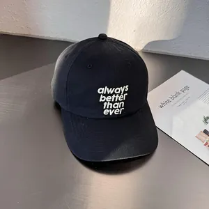 Detailed embroidery text 'always better than ever' on a black cotton baseball cap