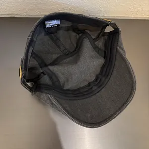 Detail of 100% cotton inner lining and stitching of the y2k style newsboy cap