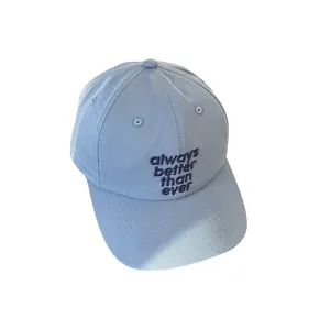 Light blue embroidered baseball cap with always better than ever text on white background