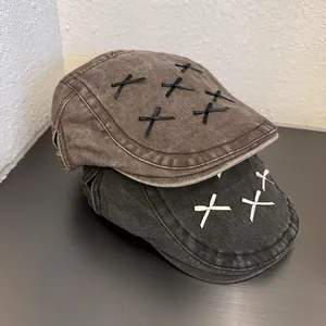 Y2K newsboy beret hats in brown and dark grey with decorative bow matrix patterns
