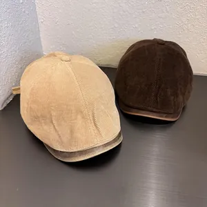 Vintage corduroy flat caps for men and women in khaki and dark brown with leather trim