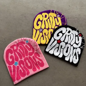 Drie hippe gebreide mutsen met Grity Visions letterpatronen en sterrenmotieven