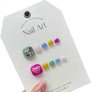 Faux ongles de pieds faits main aux couleurs acidulées avec yeux cartoon et strass