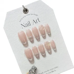 Handmade nude pink gradient cat eye press-on nails with 3D butterflies and pearls