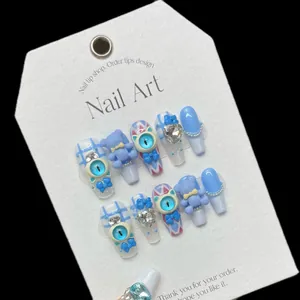 Blue and white 3D press-on nails with cute bear, rhinestones and heart charms