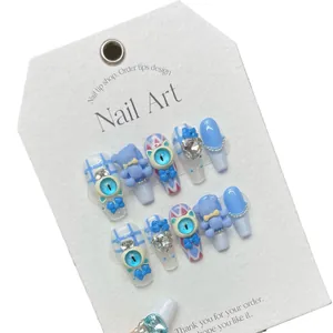 Handmade light blue press-on nails set with 3D teddy bear and heart rhinestone charms