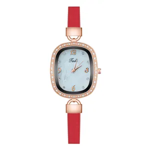 Detailed macro view of the oval rose gold watch case with crystal diamond-set bezel