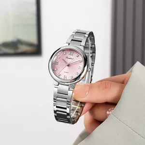 Detail shot of the pink sunburst dial watch with rhinestone markers and silver steel strap