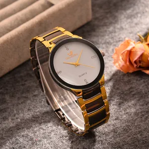Close-up of ORLANDO women's quartz watch with diamond dial and gold-tone metal strap