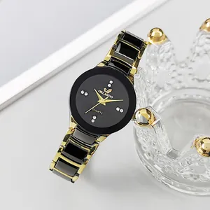 Elegant women's quartz watch with black dial, gold hands and diamond markers