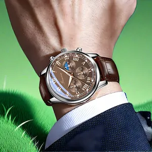Men's business quartz watch with brown leather strap and moon phase dial on wrist