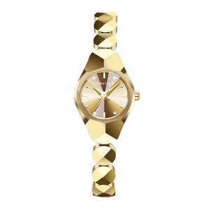 Montre à quartz dorée pour femme avec bracelet géométrique facetté et strass étincelants