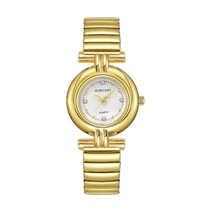Montre à quartz dorée vintage pour femme avec bracelet flexible et cadran texturé